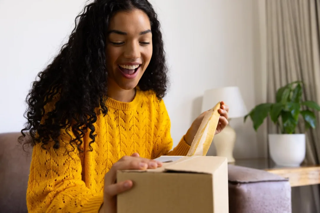 woman enjoying subscription boxes deals.