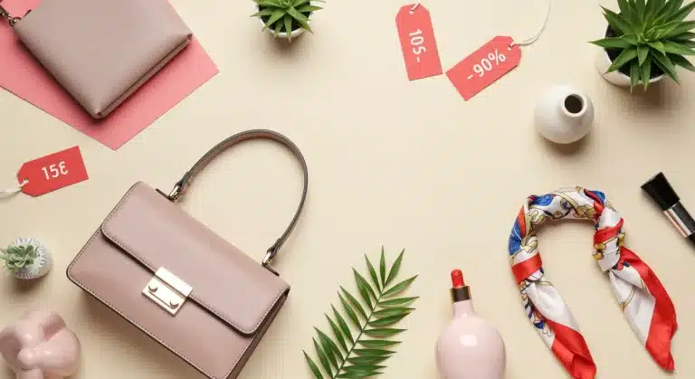 Stylish flat lay of discounted fashion and home decor items, symbolizing smart shopping and savings playbook